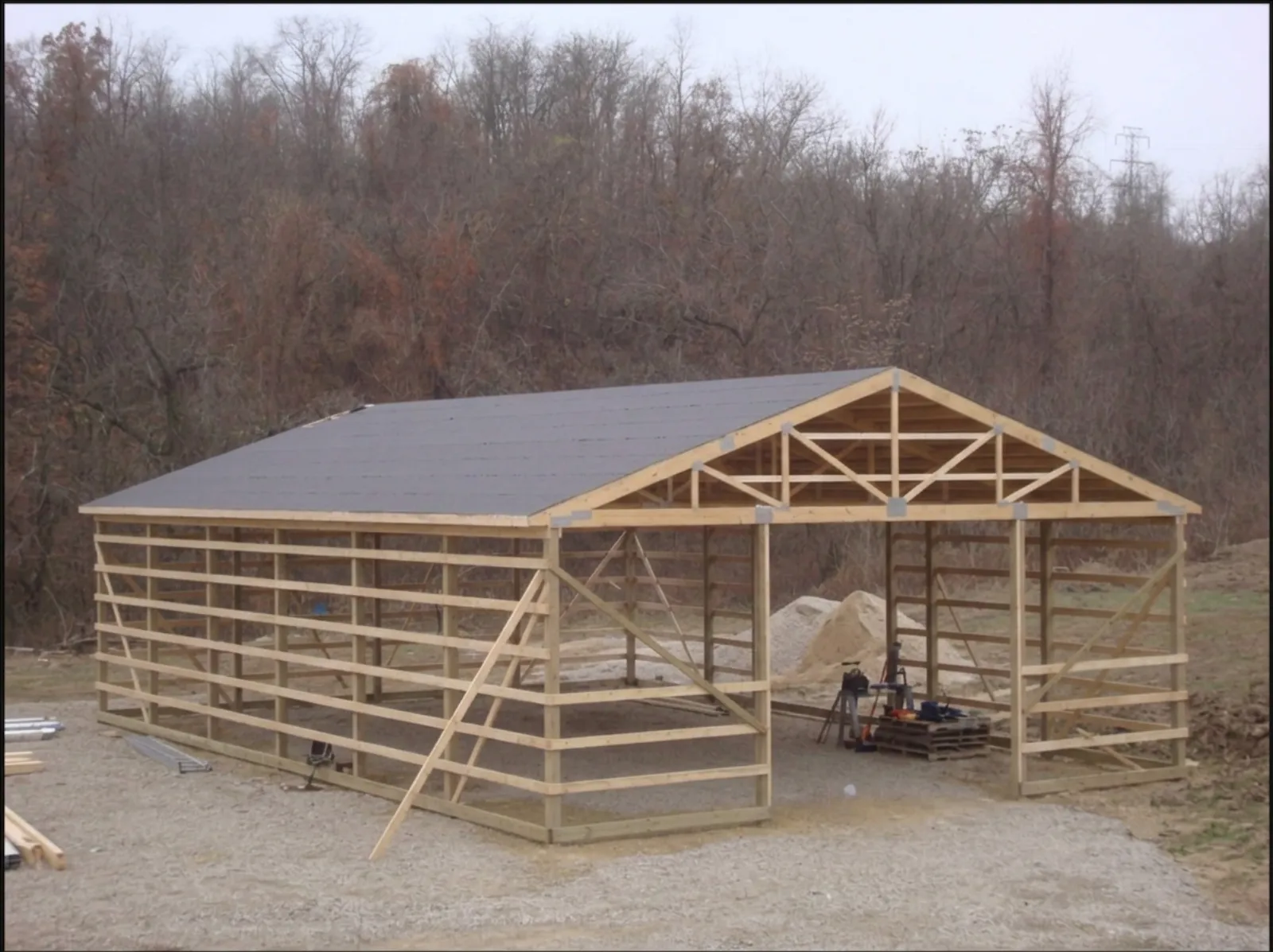 Post-frame building under construction